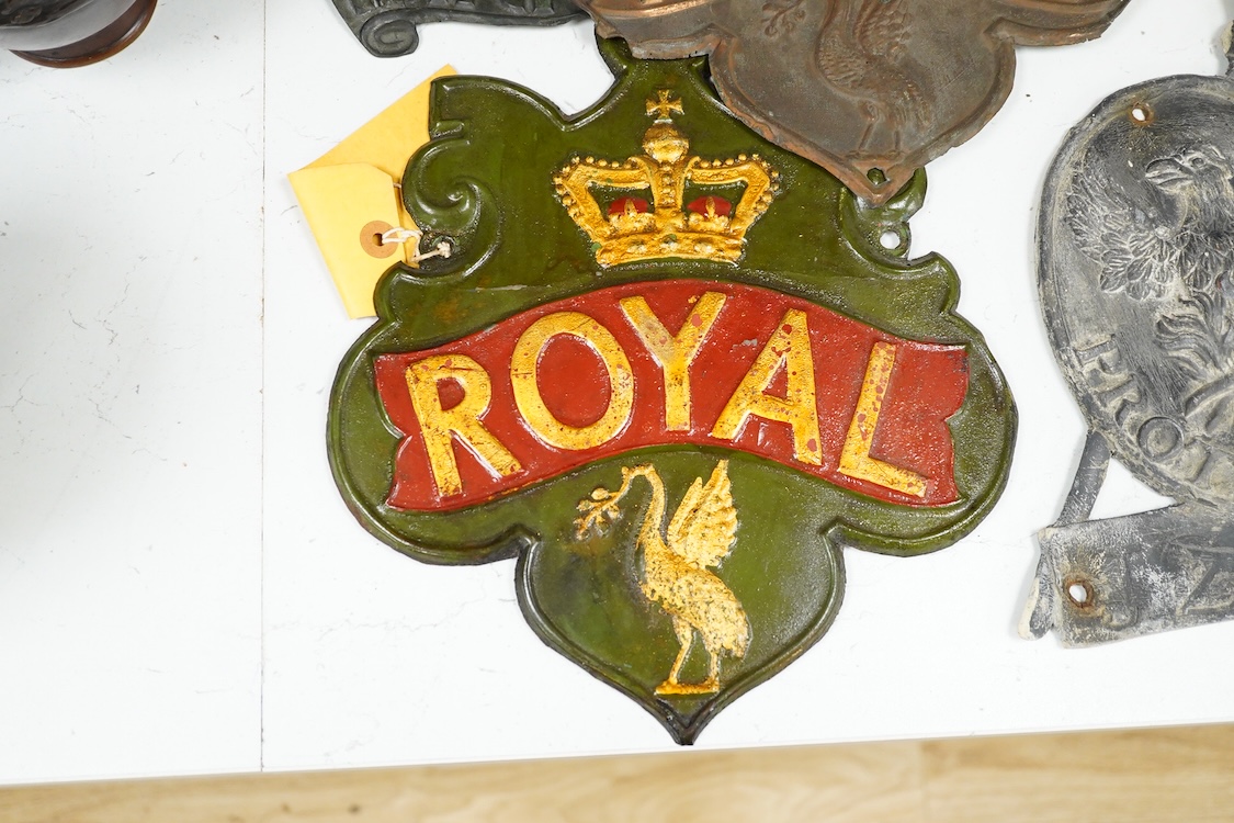 A collection of plaques to include a lead example and two copper examples one ‘Fire & Life, Farmers’, largest 30cm high